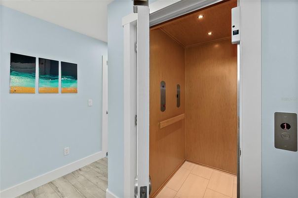 Elevator, Interior, Recessed Lighting, Wood Texture Flooring, Wooden Walls