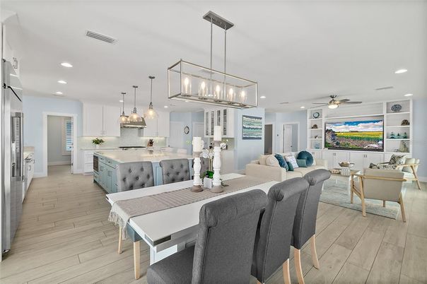 Dining room, Interior, Kitchen, Living room, Pendant Lights, Recessed Lighting, Stainless Steel Appliances, Wood Texture Flooring