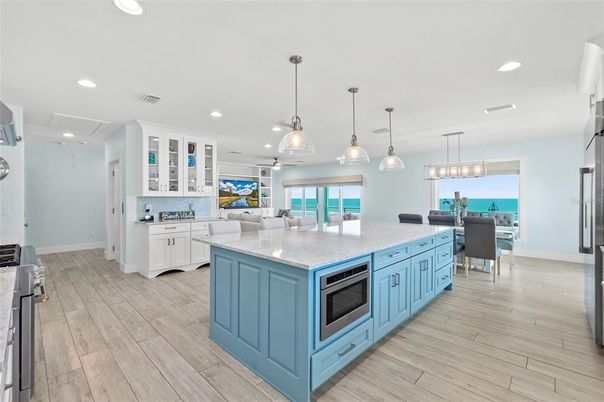 Dining room, Interior, Kitchen, Pendant Lights, Recessed Lighting, Water, Wood Texture Flooring