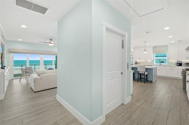 Interior, Kitchen, Living room, Pendant Lights, Recessed Lighting, Stainless Steel Appliances, Water, Wood Texture Flooring