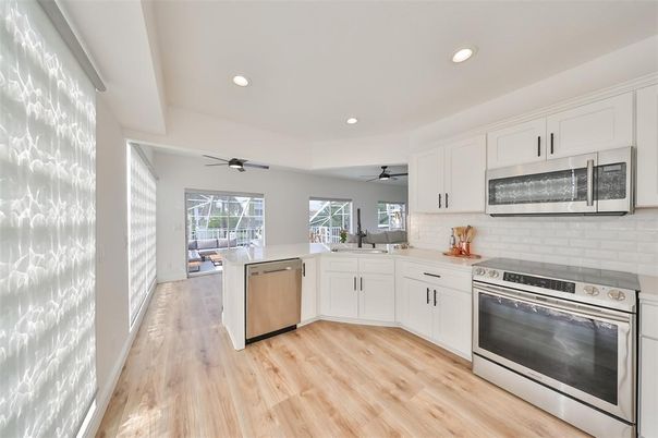 Interior, Kitchen, Recessed Lighting, Stainless Steel Appliances, Wood Texture Flooring