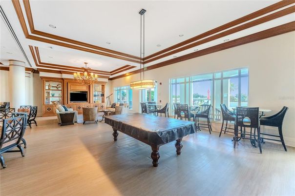 Billiard Table, Chandelier, Dining room, Game Room, Interior, Living room, Pendant Lights, Recessed Lighting, Wood Texture Flooring