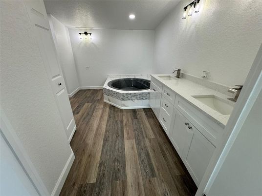 Bathroom, Dual Sink Vanities, Interior, Recessed Lighting, Wood Texture Flooring