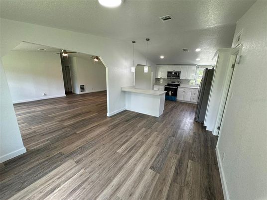 Interior, Kitchen, Pendant Lights, Recessed Lighting, Stainless Steel Appliances, Wood Texture Flooring