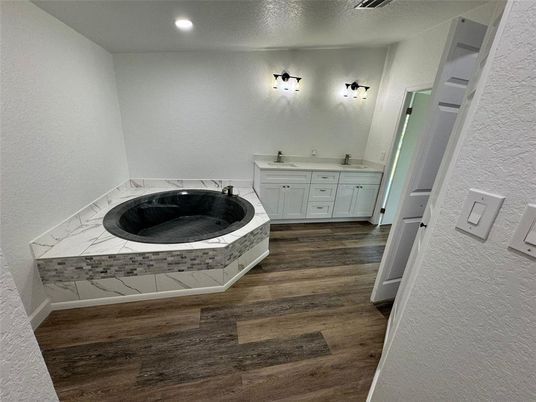 Bathroom, Dual Sink Vanities, Interior, Recessed Lighting, Wood Texture Flooring