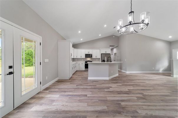 Chandelier, Interior, Kitchen, Pendant Lights, Recessed Lighting, Stainless Steel Appliances, Wood Texture Flooring