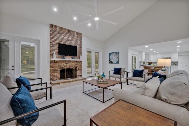Fireplace, Interior, Living room, Recessed Lighting, Stone Walls, Wood Texture Flooring