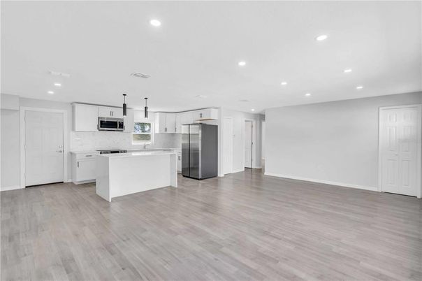 Interior, Kitchen, Pendant Lights, Recessed Lighting, Stainless Steel Appliances, Wood Texture Flooring