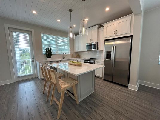 Interior, Kitchen, Pendant Lights, Recessed Lighting, Stainless Steel Appliances, Wood Texture Flooring