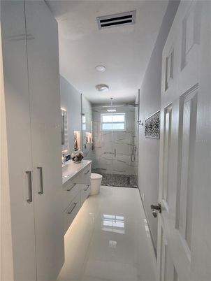 Bathroom, Dual Sink Vanities, Glass Shower, Interior, Marble Walls