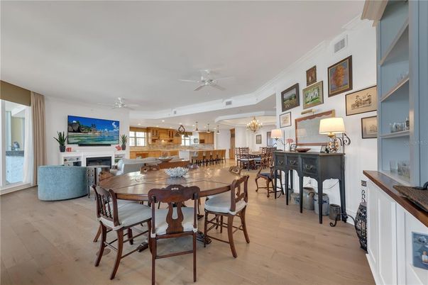 Chandelier, Dining room, Fireplace, Interior, Kitchen, Living room, Pendant Lights, Recessed Lighting, Wood Texture Flooring