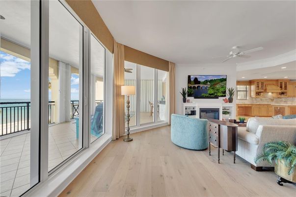 Fireplace, Interior, Kitchen, Living room, Recessed Lighting, Water, Wood Texture Flooring