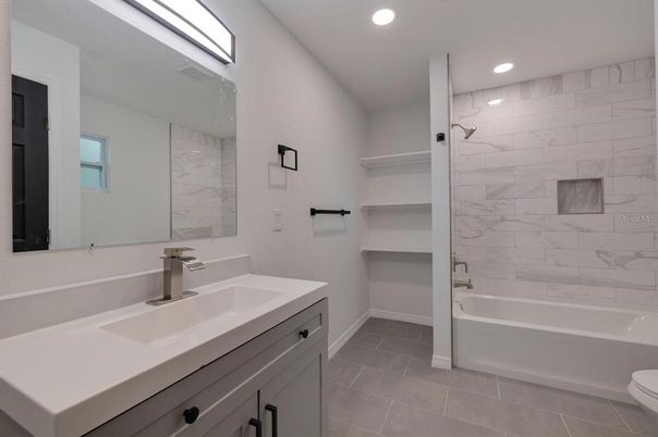 Bathroom, Dual Sink Vanities, Interior, Marble Walls, Recessed Lighting