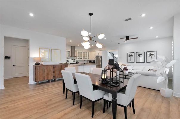 Dining room, Interior, Kitchen, Living room, Pendant Lights, Recessed Lighting, Stainless Steel Appliances, Wood Texture Flooring