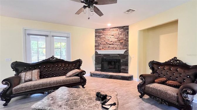 Fireplace, Interior, Recessed Lighting, Stone Walls, Wood Texture Flooring