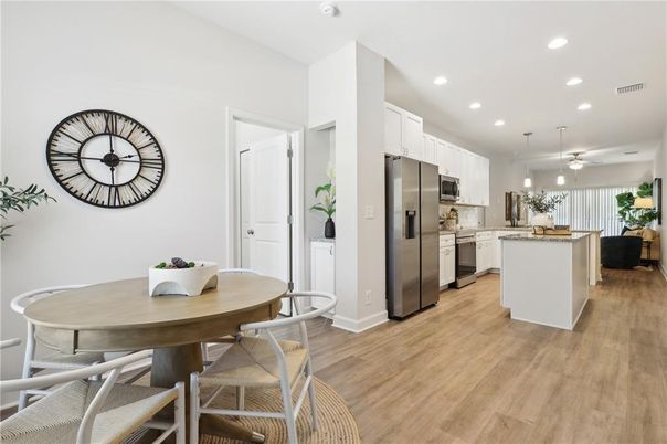 Dining room, Interior, Kitchen, Pendant Lights, Recessed Lighting, Stainless Steel Appliances, Wood Texture Flooring