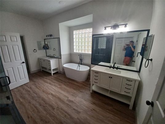 Bathroom, Dual Sink Vanities, Free Standing Baths, Interior, Wood Texture Flooring