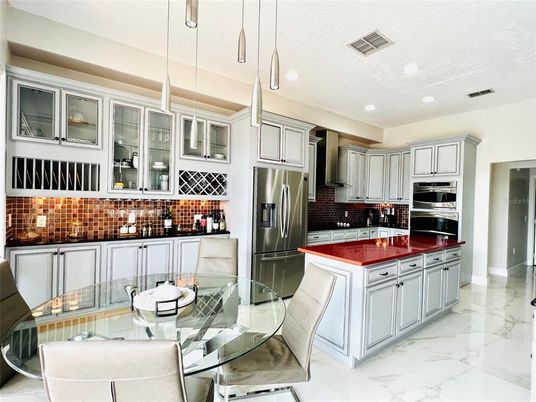 Dining room, Interior, Kitchen, Marble, Pendant Lights, Recessed Lighting, Stainless Steel Appliances