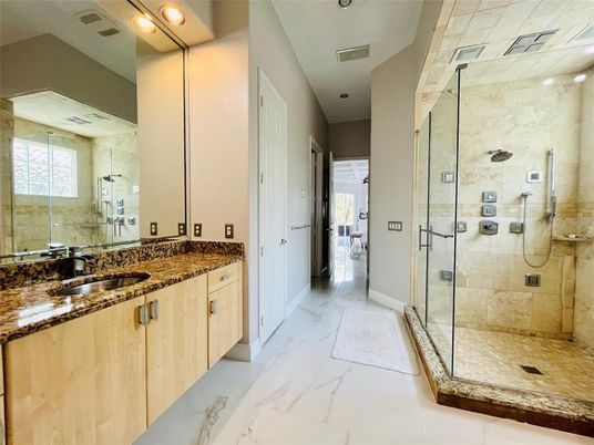 Bathroom, Dual Sink Vanities, Glass Shower, Interior, Marble, Recessed Lighting