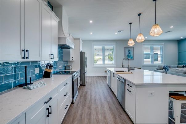 Interior, Kitchen, Pendant Lights, Recessed Lighting, Stainless Steel Appliances, Wood Texture Flooring
