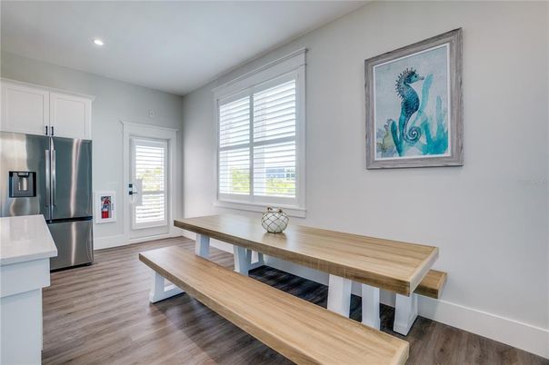 Dining room, Interior, Kitchen, Recessed Lighting, Stainless Steel Appliances, Wood Texture Flooring