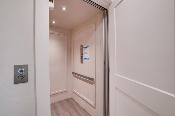 Elevator, Interior, Recessed Lighting, Wood Texture Flooring