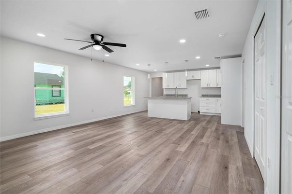 Empty room, Interior, Kitchen, Pendant Lights, Recessed Lighting, Wood Texture Flooring
