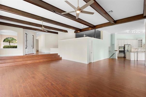 Empty room, Interior, Kitchen, Stainless Steel Appliances, Wooden Beams, Wood Texture Flooring