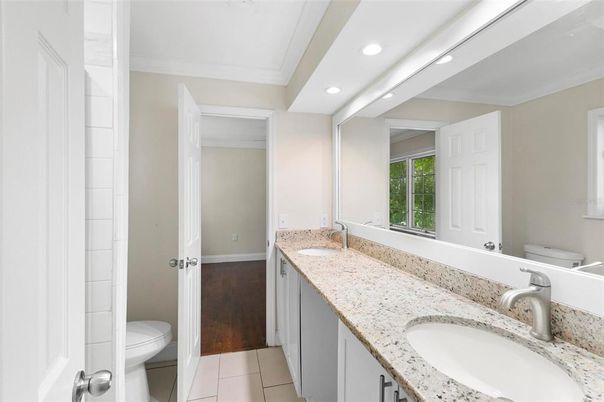 Bathroom, Dual Sink Vanities, Interior, Recessed Lighting, Wood Texture Flooring