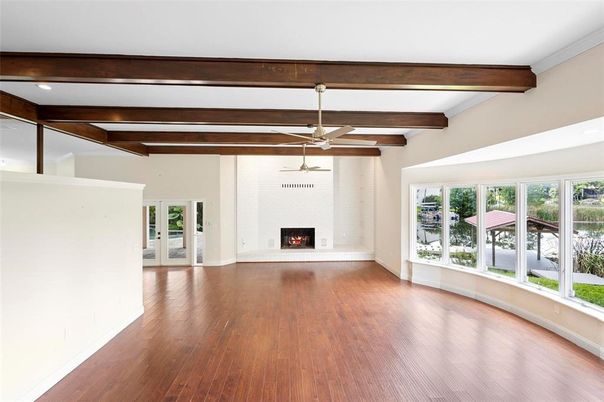 Empty room, Fireplace, Interior, Recessed Lighting, Wooden Beams, Wood Texture Flooring