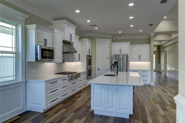 Interior, Kitchen, Recessed Lighting, Stainless Steel Appliances, Wood Texture Flooring