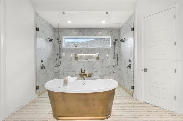 Bathroom, Free Standing Baths, Glass Shower, Interior, Marble Walls, Recessed Lighting