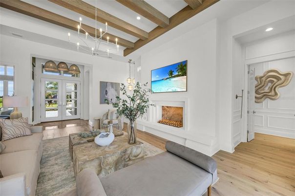 Fireplace, Interior, Living room, Pendant Lights, Recessed Lighting, Wooden Beams, Wood Texture Flooring