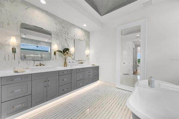 Bathroom, Dual Sink Vanities, Free Standing Baths, Interior, Marble Walls, Recessed Lighting