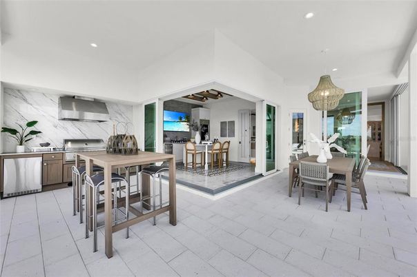 Chandelier, Dining room, Interior, Kitchen, Marble Walls, Pendant Lights, Recessed Lighting, Stainless Steel Appliances