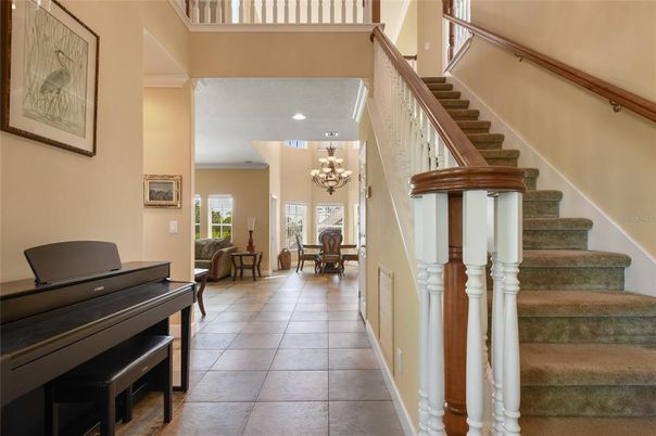 Chandelier, Dining room, Interior, Piano, Recessed Lighting