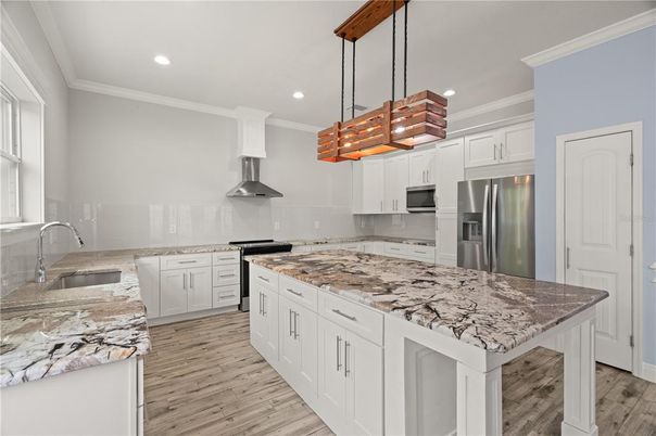 Interior, Kitchen, Pendant Lights, Recessed Lighting, Stainless Steel Appliances, Wood Texture Flooring