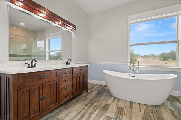 Bathroom, Dual Sink Vanities, Free Standing Baths, Interior, Wood Texture Flooring
