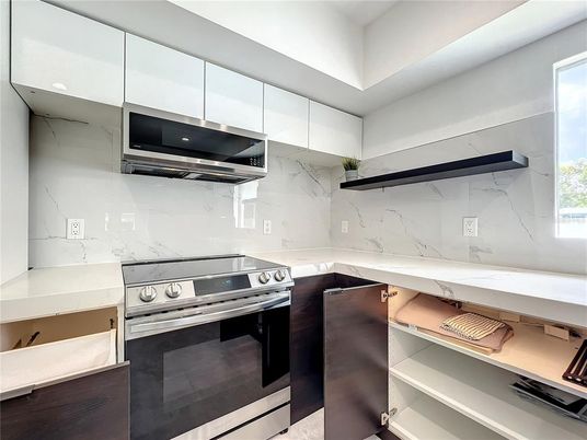 Interior, Kitchen, Marble Walls, Stainless Steel Appliances