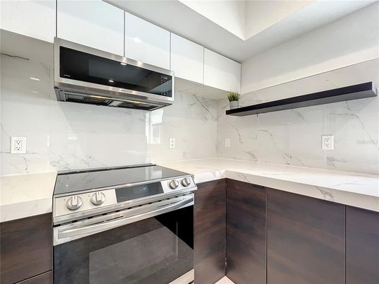 Interior, Kitchen, Marble Walls, Stainless Steel Appliances