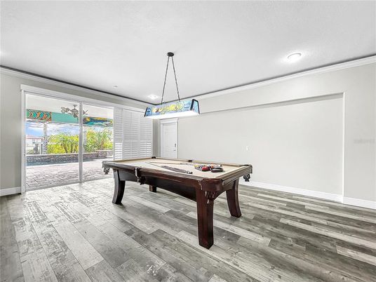 Billiard Table, Game Room, Interior, Pendant Lights, Recessed Lighting, Wood Texture Flooring