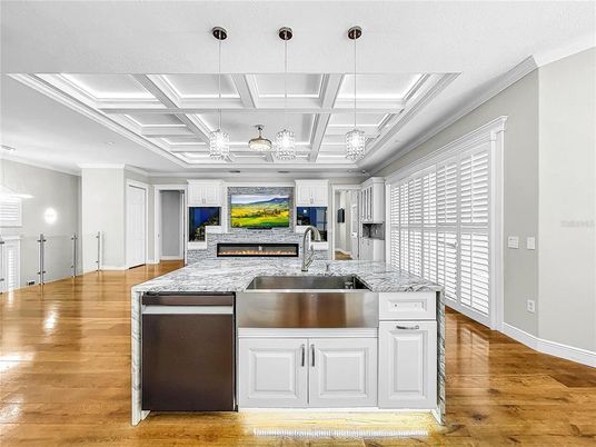Fireplace, Interior, Kitchen, Pendant Lights, Recessed Lighting, Stainless Steel Appliances, Wood Texture Flooring
