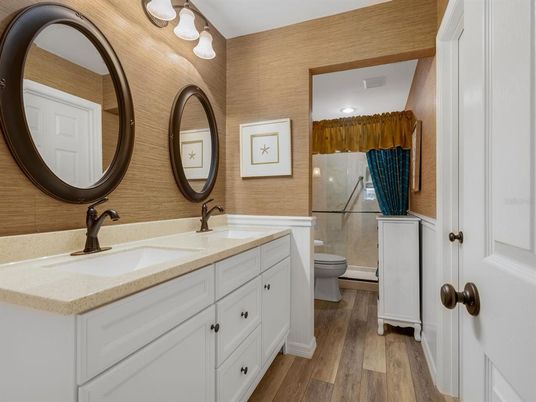 Bathroom, Dual Sink Vanities, Interior, Recessed Lighting, Wood Texture Flooring