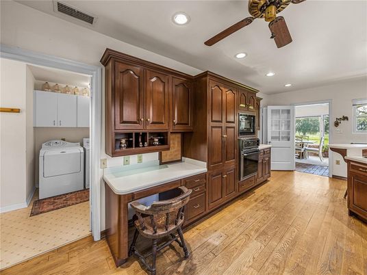 Interior, Kitchen, Recessed Lighting, Washer, Wood Texture Flooring