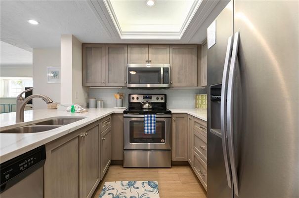 Interior, Kitchen, Recessed Lighting, Stainless Steel Appliances, Wood Texture Flooring