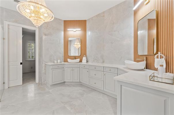 Bathroom, Chandelier, Dual Sink Vanities, Interior, Marble, Marble Walls