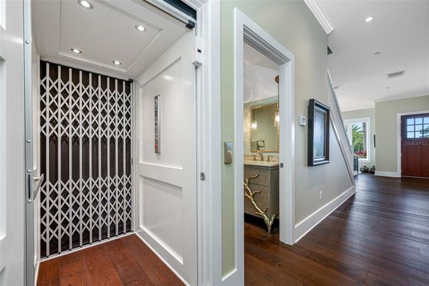 Elevator, Interior, Recessed Lighting, Wood Texture Flooring