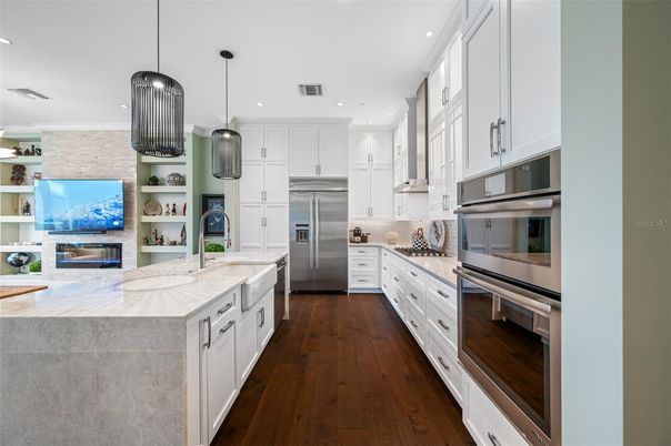 Interior, Kitchen, Pendant Lights, Recessed Lighting, Stainless Steel Appliances, Wood Texture Flooring