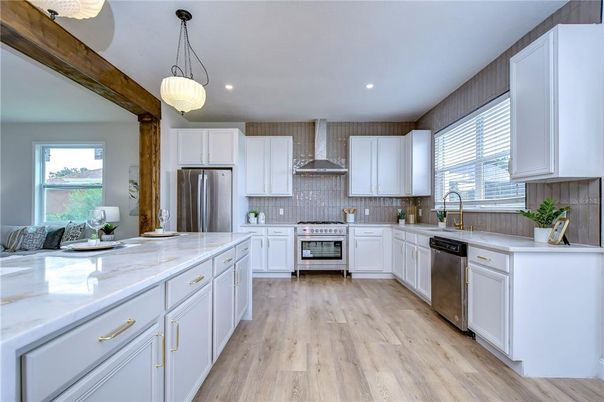 Interior, Kitchen, Pendant Lights, Recessed Lighting, Stainless Steel Appliances, Wood Texture Flooring