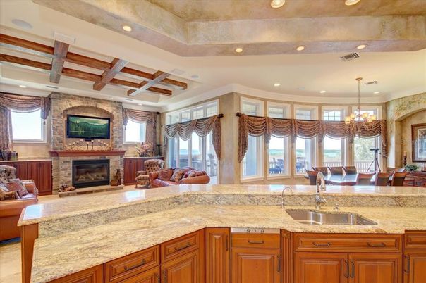 Chandelier, Dining room, Fireplace, Interior, Living room, Recessed Lighting, Wooden Beams